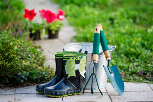 Team member preparing equipment before lawn mowing in Regents Park