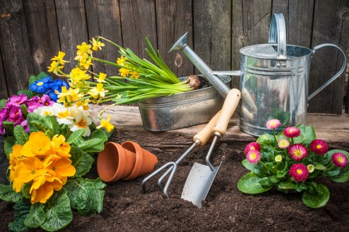 Gardener preparing equipment before a remedial visit